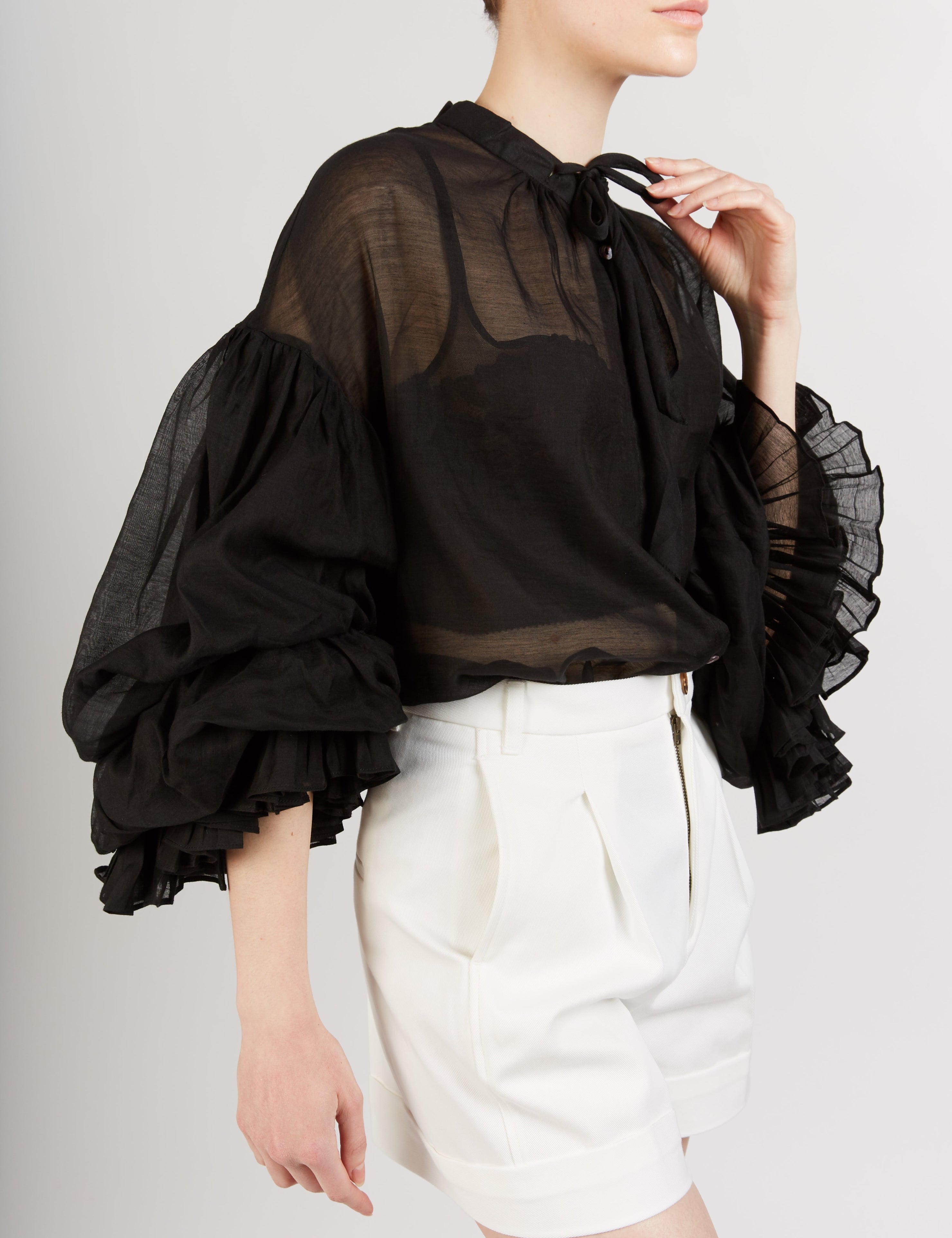 Side view of Rayne black Blouse by Thierry Colson