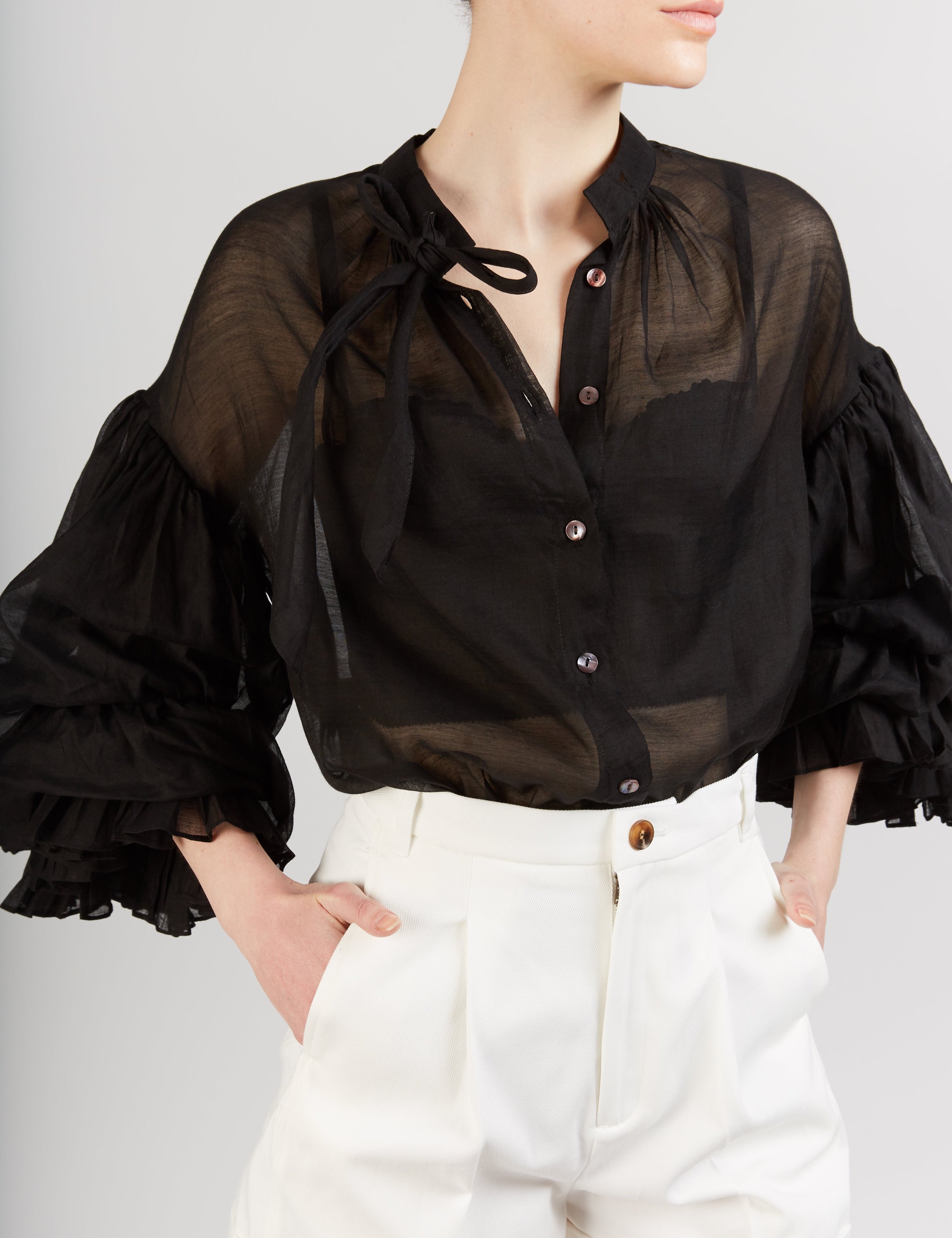 Close up Front view of Rayne black Blouse by Thierry Colson