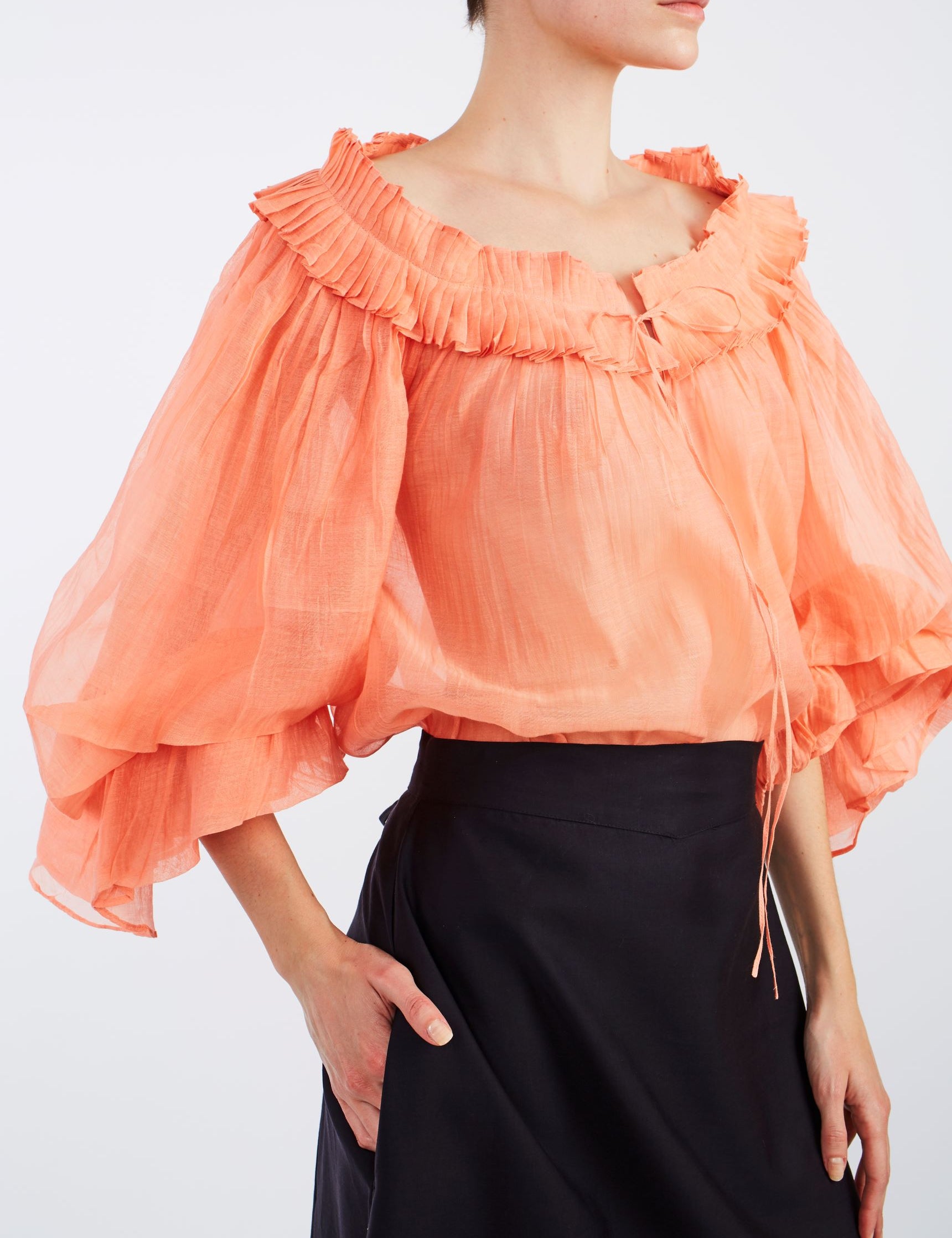 Close up view of Roussia coral Blouse by Thierry Colson 