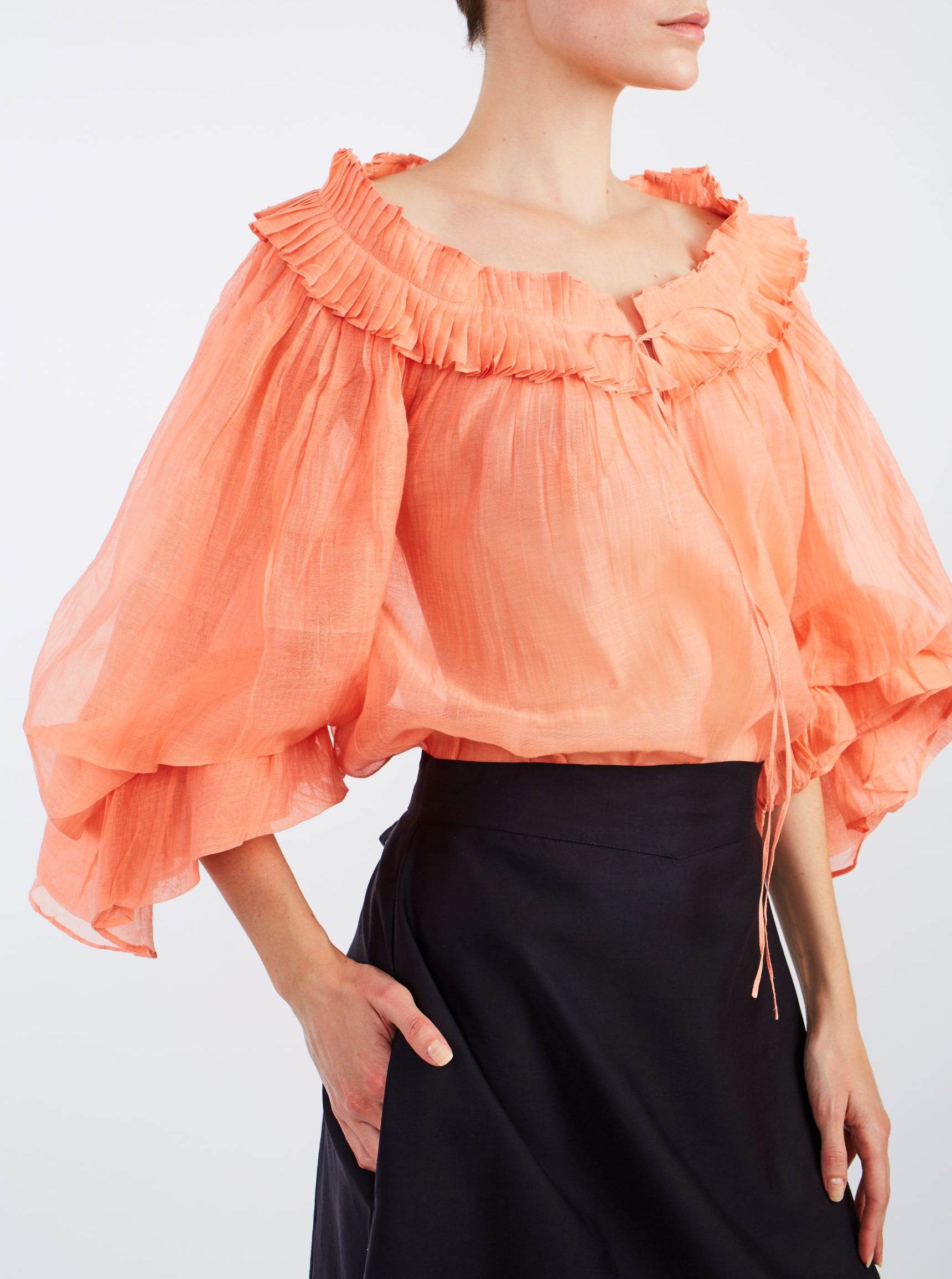 Close up view of Roussia coral Blouse by Thierry Colson 