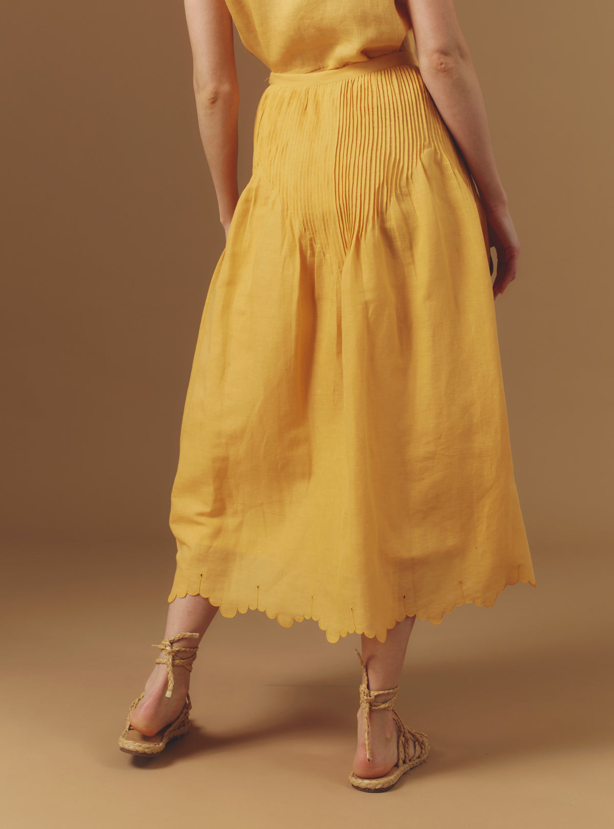 Back view of Verde Barocco Scallops Sunflower Skirt by Thierry Colson