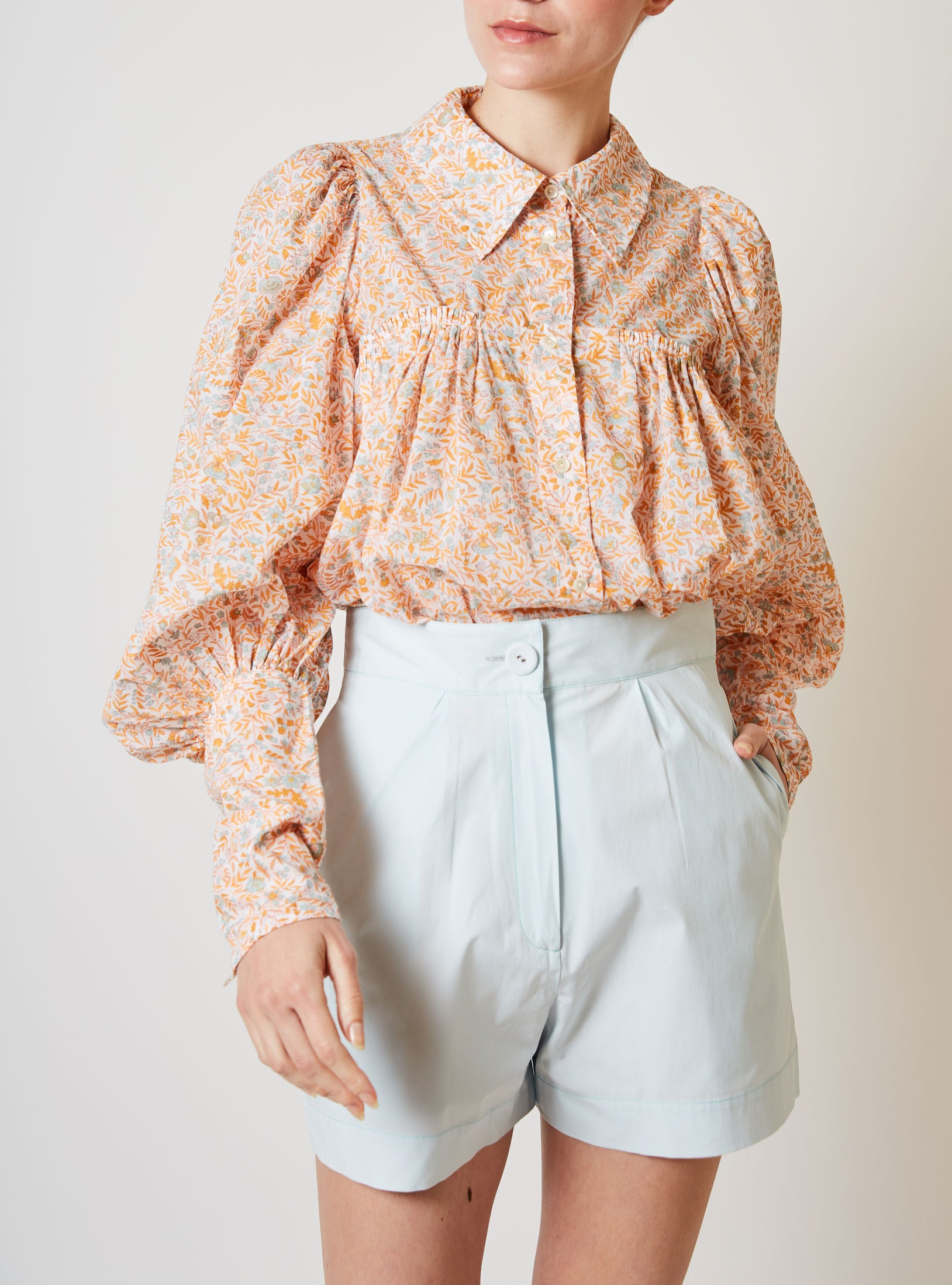 Font view of Wallis Floral Jaal Multico Mango Blouse with shorts by Thierry Colson 