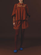 Large Front view Kenya Burnt Orange Short with Wallis Blouse by Thierry Colson
