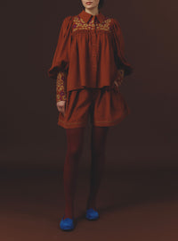 Large Front view Kenya Burnt Orange Short with Wallis Blouse by Thierry Colson