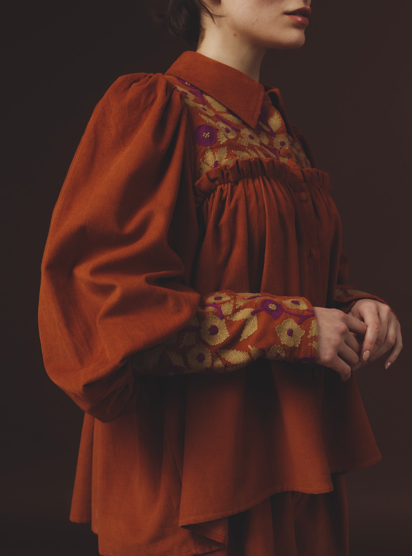 Side view of Wallis Burnt Orange Blouse - Embroidered Corduroy by Thierry Colson