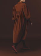 Back side view of Wendy Squirrel Brown Dress - Plain Corduroy by Thierry Colson