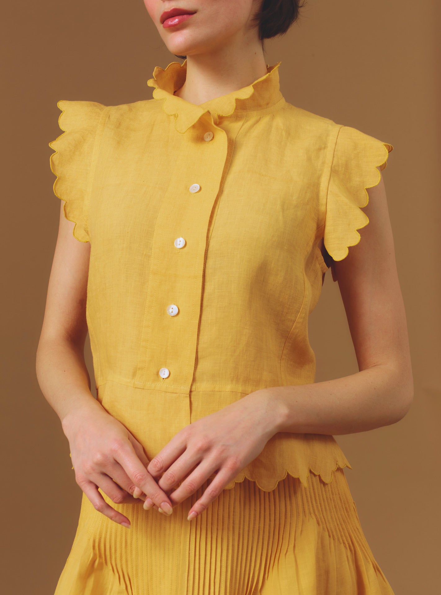 Front view of Yael Barocco Scallops Sunflower Vest by Thierry Colson